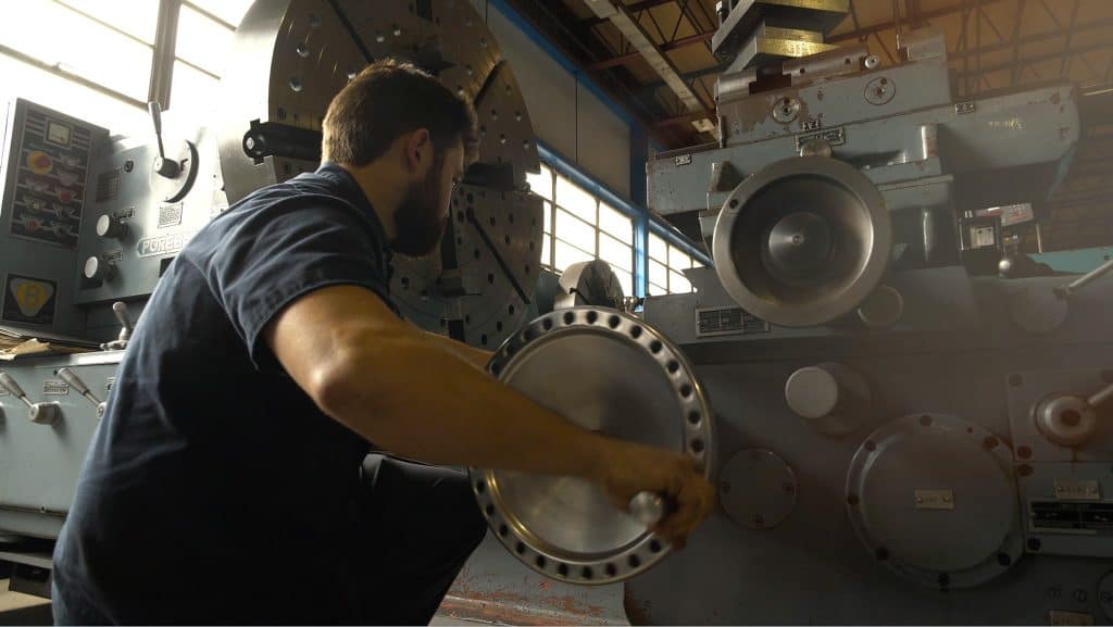 man working on a machine